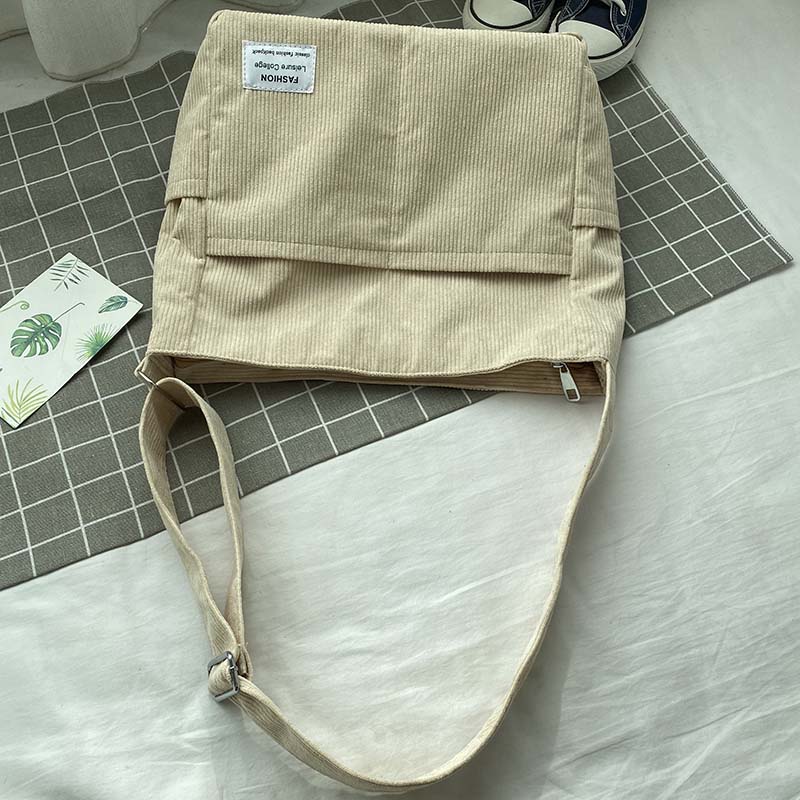 Skulderveske i kanvas - Avslappet og elegant stil 