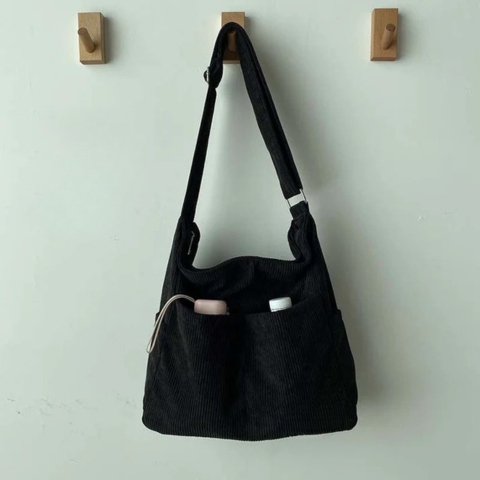 Skulderveske i kanvas - Avslappet og elegant stil 